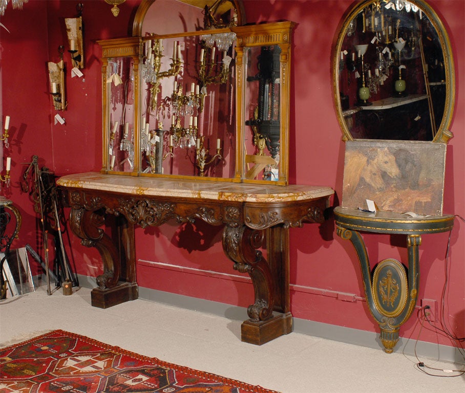 Very fine hand carved wood console having excellent detail,  with beveled marble top