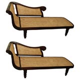 Opposing pair of caned Anglo-Indian chaises