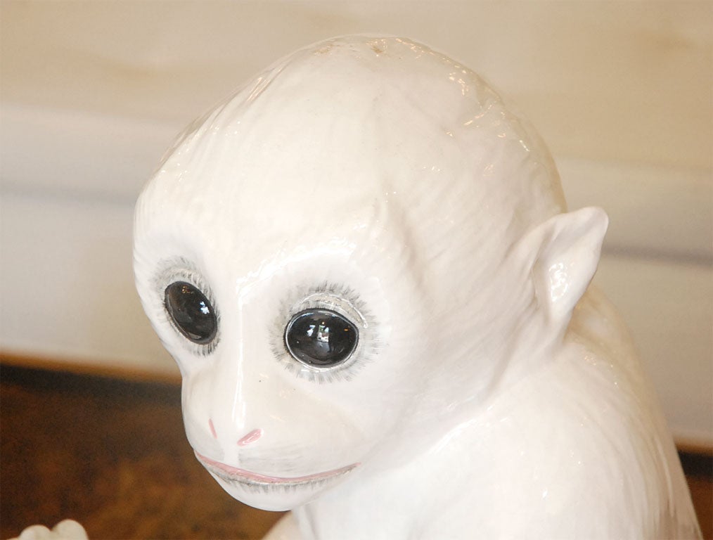 white ceramic monkey
