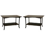 A Pair of Robsjohn-Gibbings Two Tiered Saber Legged End Tables.