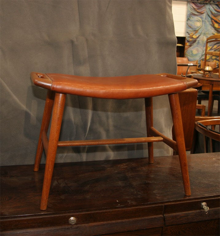 This Wegner Piano Stool, though it was made to stand as it's own unique piece, is also known as the ottoman for the Papa Bear Chair.