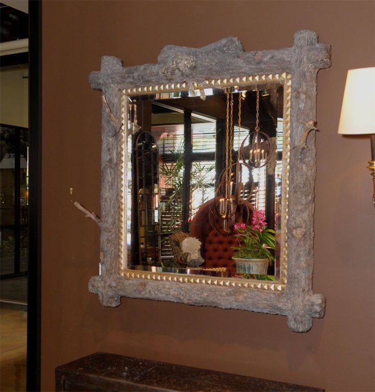 lichen-colored faux bois branch mirror<br />
of hand molded papier maiche<br />
inset with beautiful, antiqued mirror