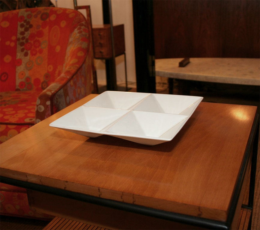 A geometric divided ceramic tabletop tray with glossy white glaze by Kaj Franck for Arabia. Finnish, circa 1960.