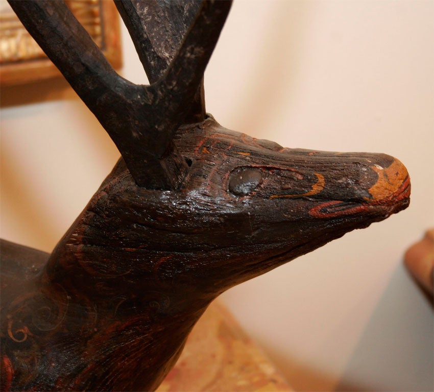 An Extremely Rare Wooden Figure of a Recumbant Stag
