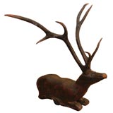 An Extremely Rare Wooden Figure of a Recumbant Stag