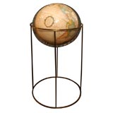 Vintage globe on brass stand by Paul McCobb