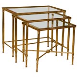 MID CENTURY NESTING TABLES IN THE STYLE OF BAGUES