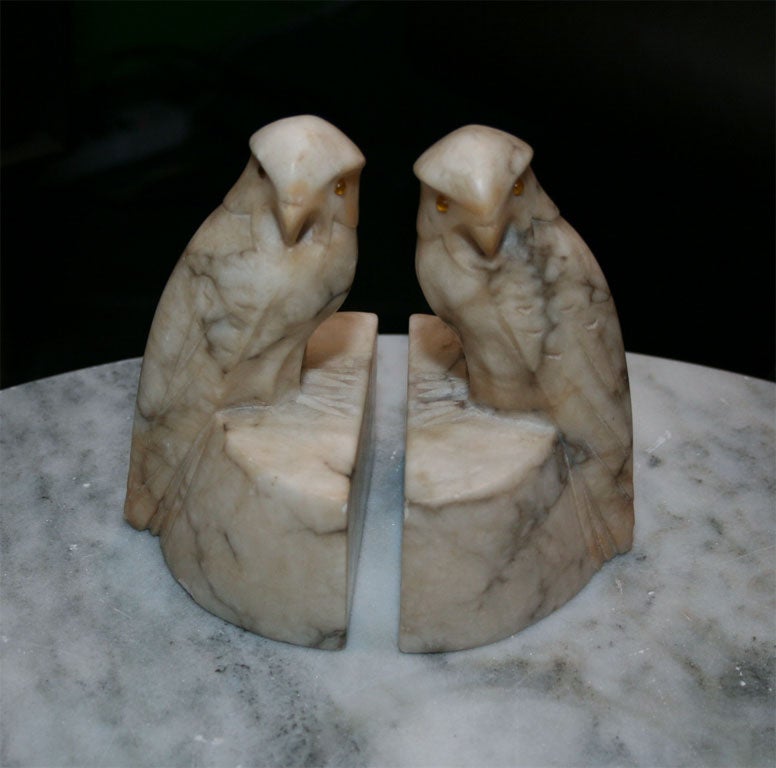Art Deco Bookends have beautiful carved marble.