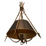 A bronze chandelier in the manner of  Andre Arbus