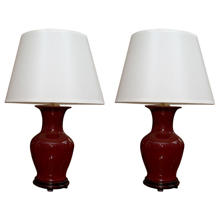Pair of Chinese Oxblood Porcelain Fish Tail Lamps