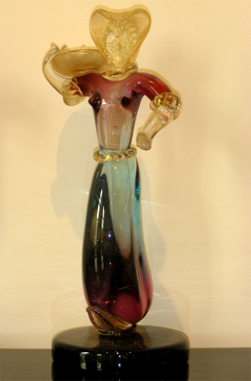 Two 1950s Murano glass figurines by Seguso, not signed. One is slightly lower: 34 cm. high., same diameter.