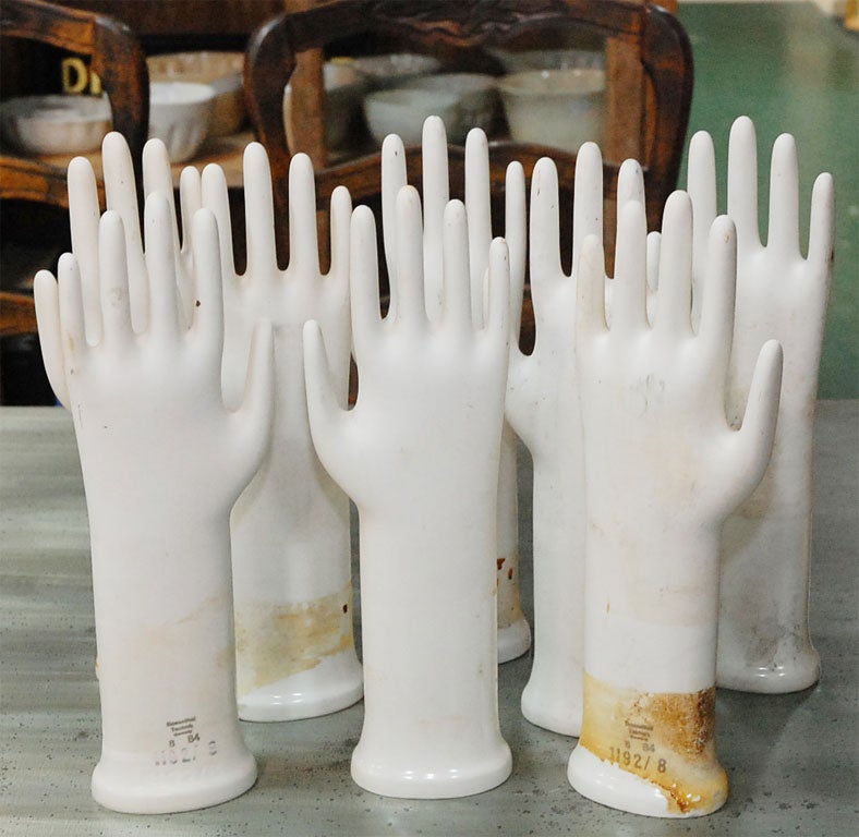 These C.1920 porcelain hands were once used as glove molds. Now they are very hip sculptural items for the home, office, jewelry display, classroom, etc. These are all the same size, but there are right and left hands in the group. They all have