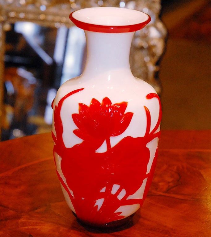 This is a striking red and white Peking glass vase. The colors are so pure and vibrant that for a vase it makes a strong statement.
