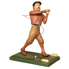 Wood carving golfer