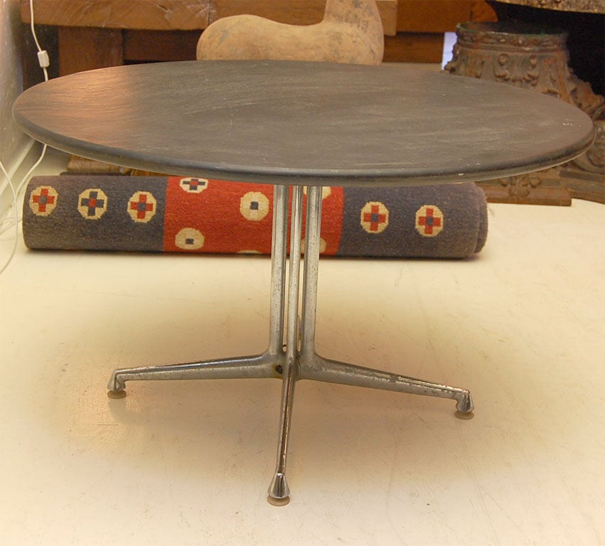 Low Table with Circular Slate Top  on Four Pronged Aluminum  Base.  The Lafonda Designed by Charles Eames for Herman Miler