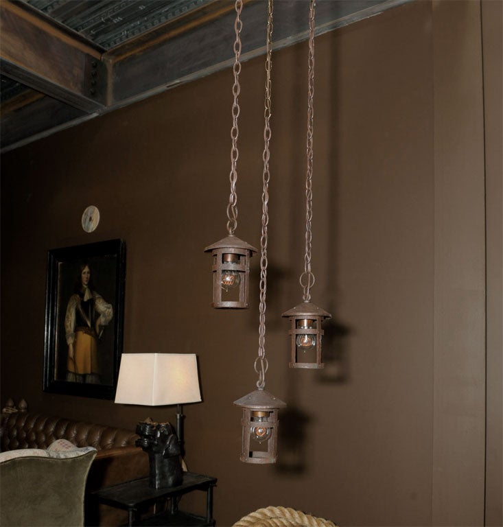 rusted metal lanterns, wired and electrified<br />
featuring single Edison filament bulbs<br />
(each sold separately)<br />
<br />
11” H x 6” Dia