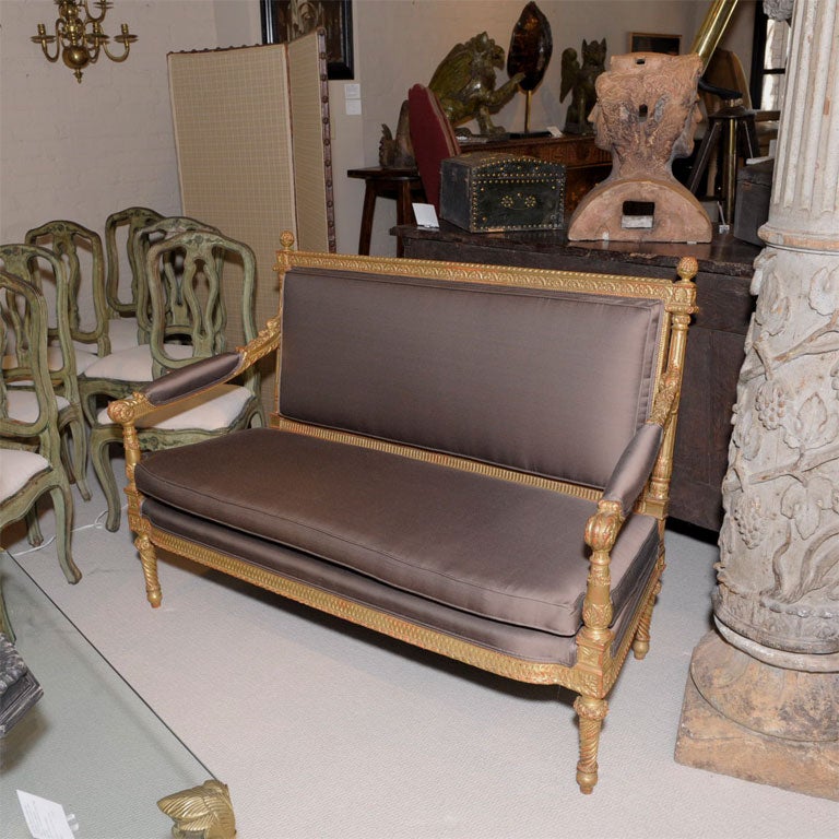 Exceptional Louis XVI-style three-piece salon set with beautifully carved, gilded wood frames and rich brown silk upholstery - after Jean-Baptist-Claude Sene  -                 <br />
Lit. Le Mobilier du louvre - p.86-88  (Settee and chairs may be