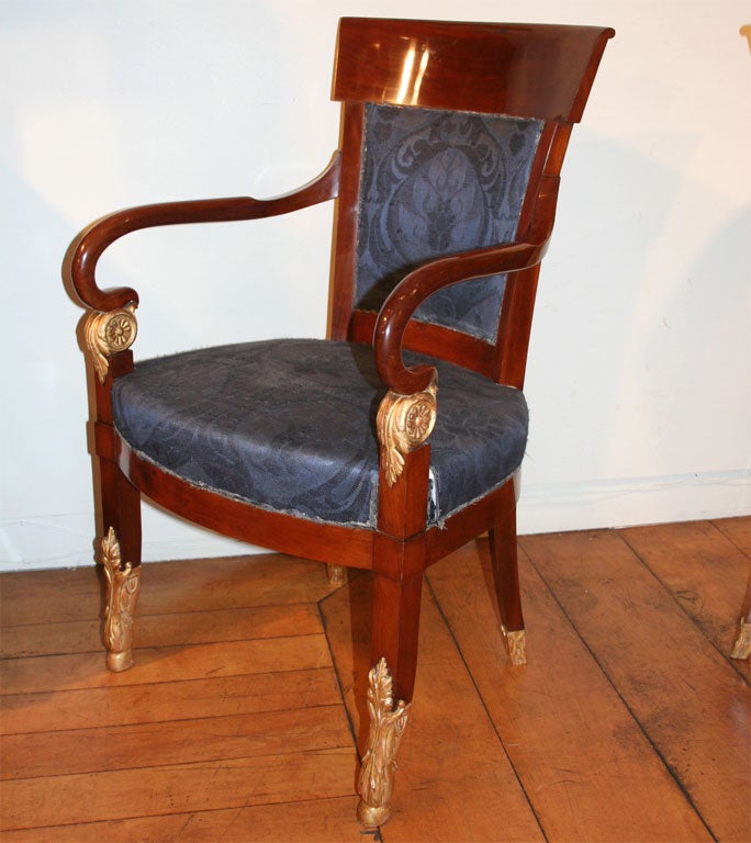 A Set of Eighteen (18) Spanish Mahogany and Giltwood Dining Chr