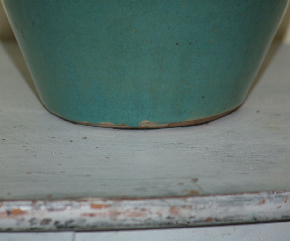 A ENGLISH GREEN POTTERY VASE SIGNED BY PICKFULL 1