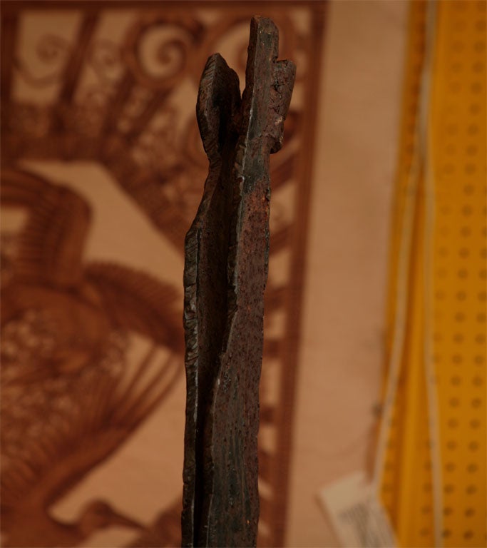 STEEL SCULPTURE OF TWO STANDING FIGURES