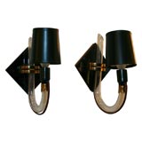 Pair of Vitrolite
Glass Sconces with Antique Brass Fittings Pair of Vitrolite
Glass Sconces with Antique Brass Fittings