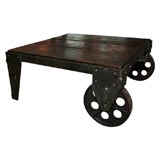 VINTAGE CART COFFEE TABLE WITH DARK WOOD TOP