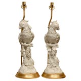 PAIR OF WHITE PORCELAIN PARROTS AS LAMPS