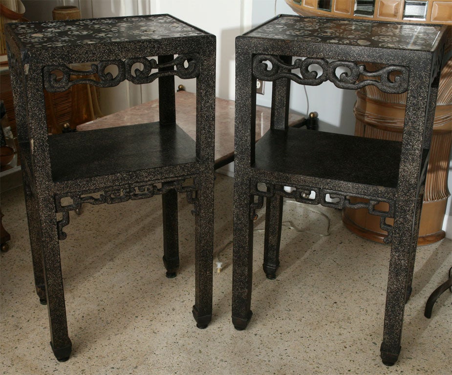A little battered and bruised, (but utterly charming), pair of Chinese tea tables. Lacquered with crushed mother-of-pearl on sides and bottom, inlaid with it on the top. We know these were shipped to the States in the late 1800's, but other than