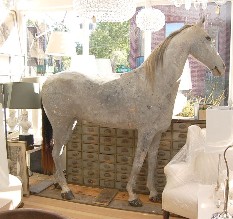 Life sized horse from a Victorian tack shop, wooden hooves, horsehair mane and tail, glass eyes, articulated mouth, painted gray surface with nice patina
