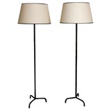 Pair of leather standing lamps by Jacques Adnet