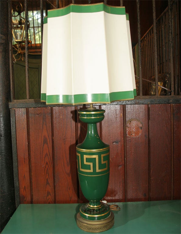 Reversed painted green glass lamp with Greek Key design with original heavy paper fluted shade. 17