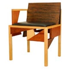 Robert Wilhite mix wood and leather one arm chair,signed,studio 11