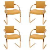 Set of Four Stainless Steel and Leather Upholstered Chairs