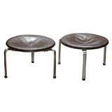 Poul Kjaerholm by Fritz Hansen low round leather stools