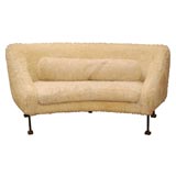 Shaggy white sofa with bronze legs