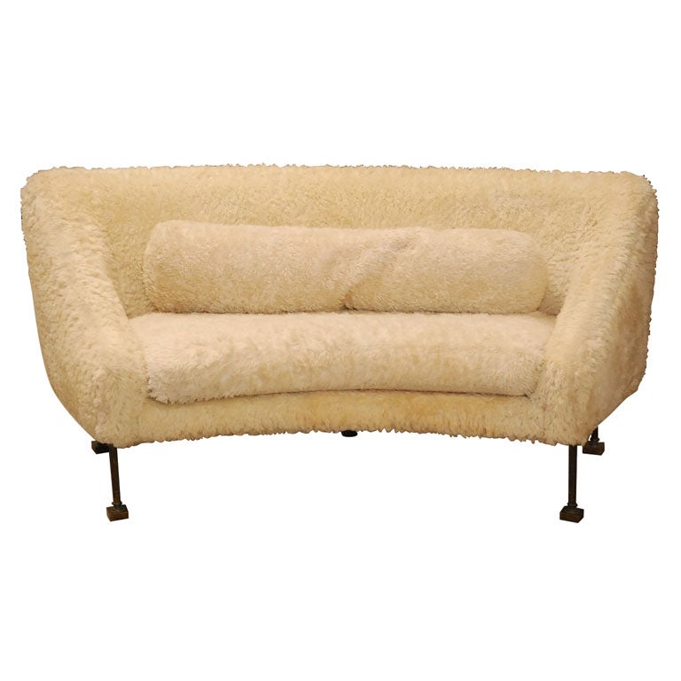 Shaggy white sofa with bronze legs