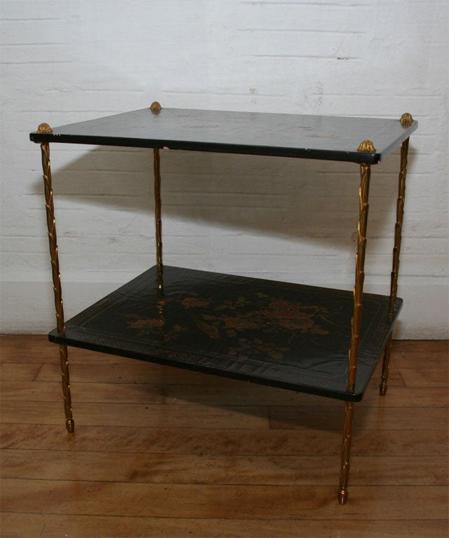 Pair of end tables with japanned decoration and gilt metal legs