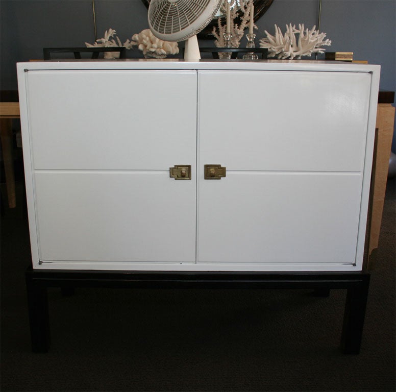 White Buffet with Ebonized Legs and Brass Hardware.