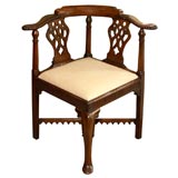 Antique English mahogany corner chair.