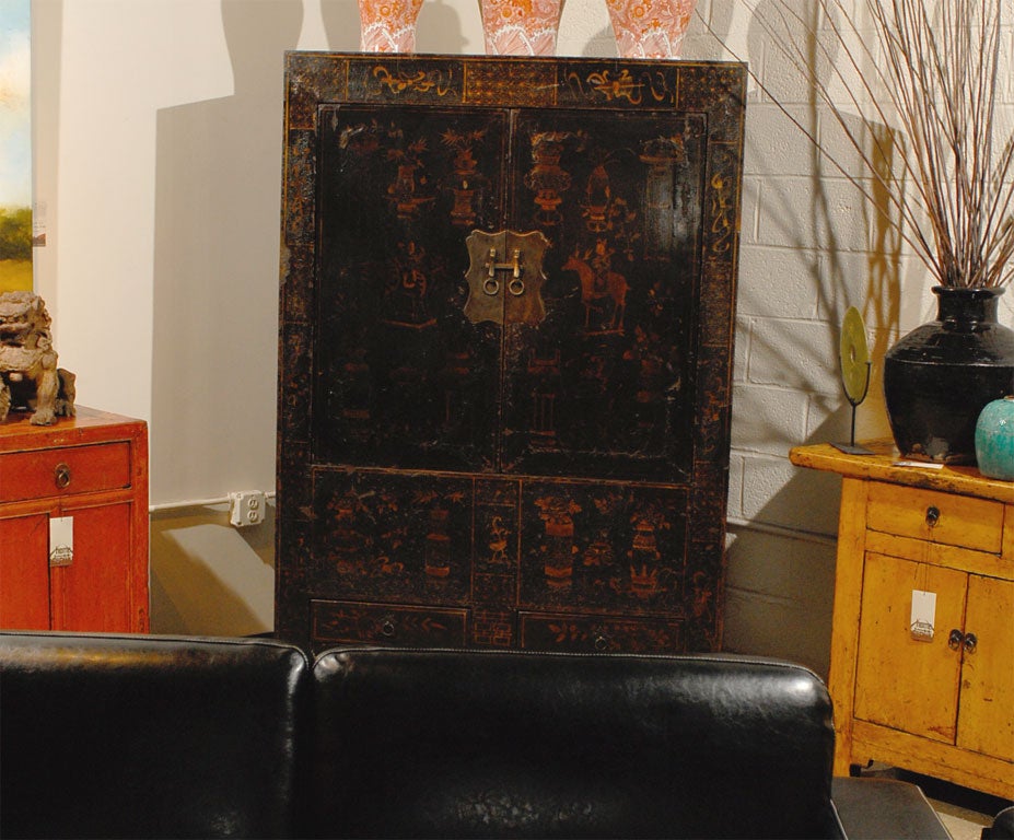 Wedding cabinet with black lacquer and gold foiling over linen.  This piece is made from yumu wood and came out of a scholar’s home.  Piece is in excellent condition and has fantastic detail.