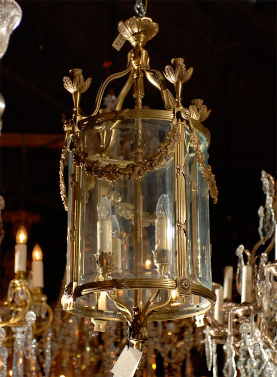 Very fine gilt bronze lantern with beveled glass panels and oak leaf garlands