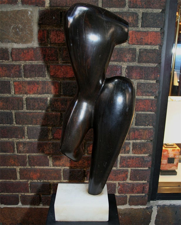 A modernist wood sculpture Abstract Torso signed Brumme, 1946.