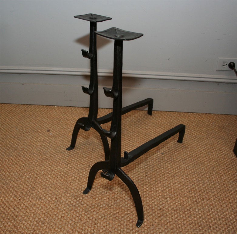 Unique pair of 18th century wrought iron andirons, the square flat dished tops with 