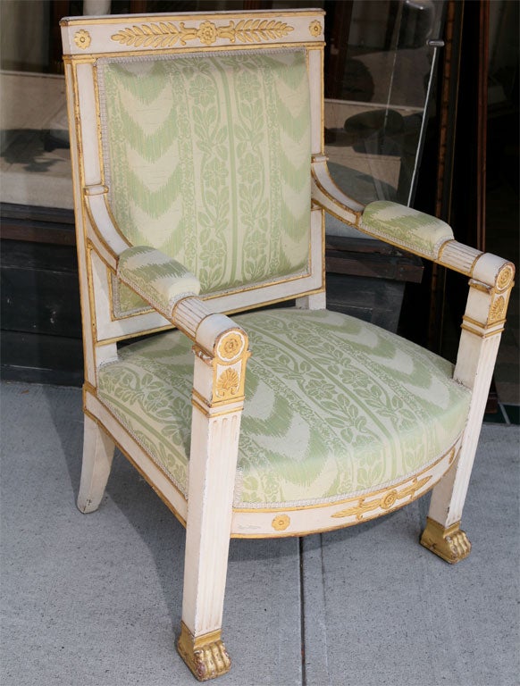 This important pair of chairs  from the empire peroid are large in scale and dramatic if making a statment is required.We are not sure if they are from France or Italy but the style was clearly set thruout France and that part of Italy controlled by