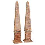 PAIR OF TALL LAMINATED TILE OBELISKS