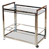 Chrome and glass serving cart table, in the style of Willy Rizzo