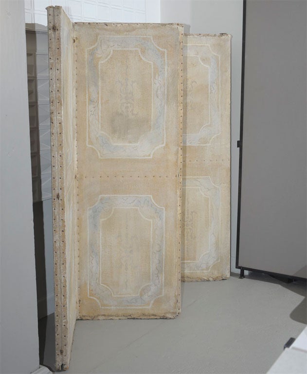 Six hand painted canvas panels in subtle tones made into folding screen
