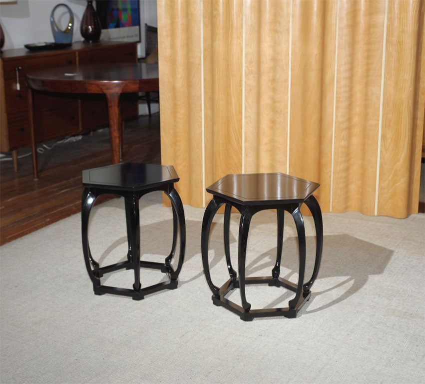 Pair of Baker black lacquer end tables in the japanese taste. Completely restored.