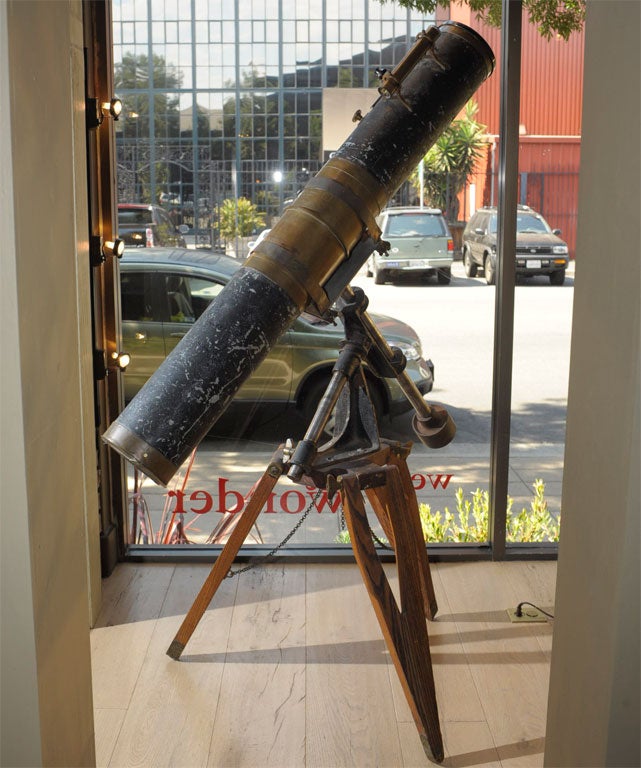 of brass, steel, wood, and ebony gesso<br />
on splayed, adjustable tripod stand<br />
this awesomely-constructed, working telescope defines 