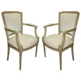 Pair of painted wood Louis XVI style armchairs by Jansen